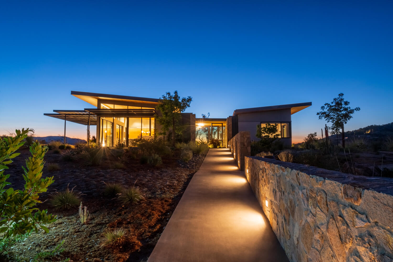 Napa Modern main house view from poolhouse.